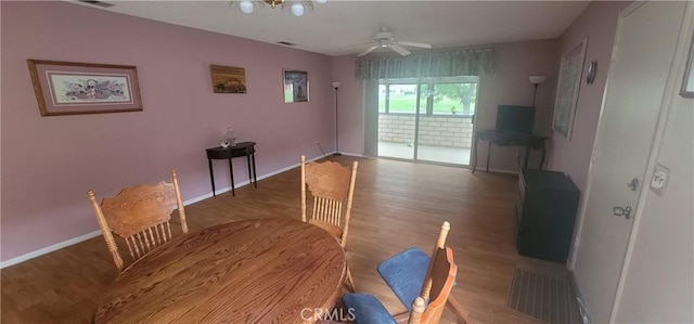 643 W Villa Chaparral Rd, San Jacinto, CA 92583 - dining area featuring wood finished floors, ceiling fan, baseboards, and visible vents