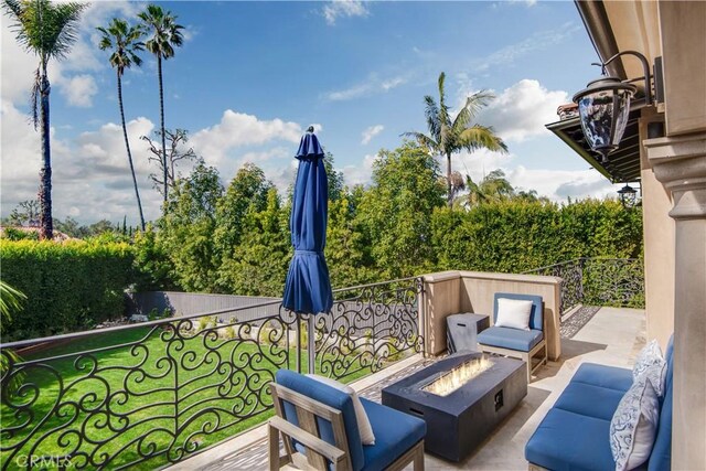 1217 Granvia Altamira, Palos Verdes Estates, CA 90274 - wooden deck featuring a yard and an outdoor living space with a fire pit