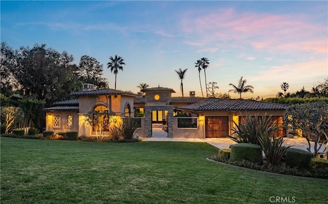 1217 Granvia Altamira, Palos Verdes Estates, CA 90274 - back of house featuring stucco siding, a chimney, a lawn, and a tile roof