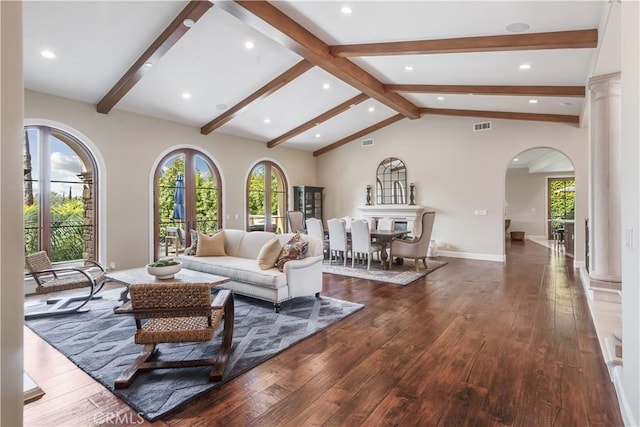 1217 Granvia Altamira, Palos Verdes Estates, CA 90274 - living room featuring arched walkways, visible vents, hardwood / wood-style floors, and a healthy amount of sunlight