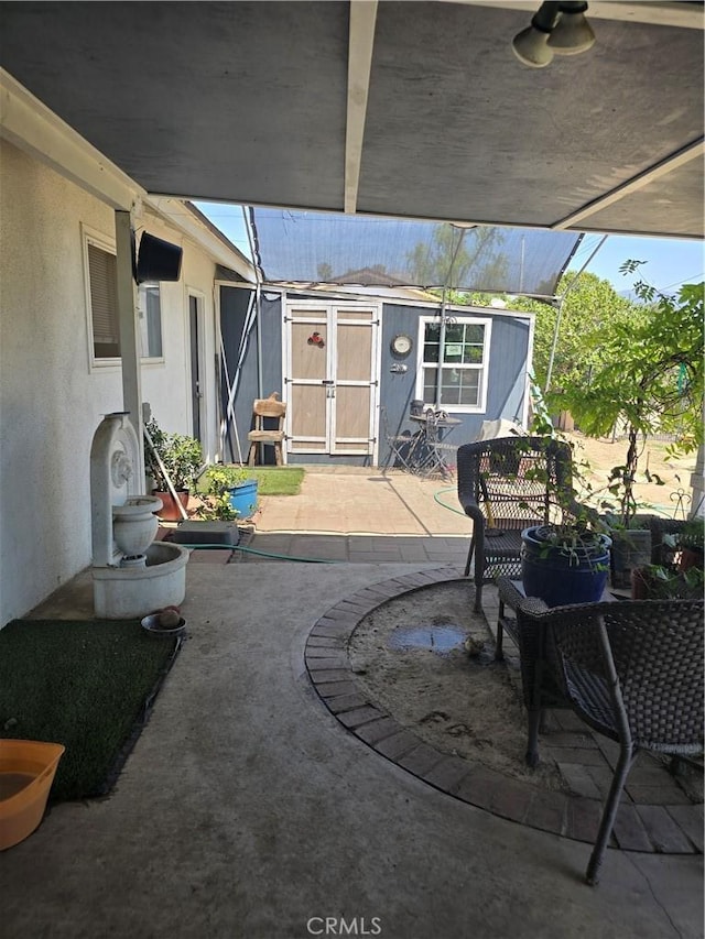 1861 N Lilac Ave, Rialto, CA 92376 - view of patio featuring an outdoor structure