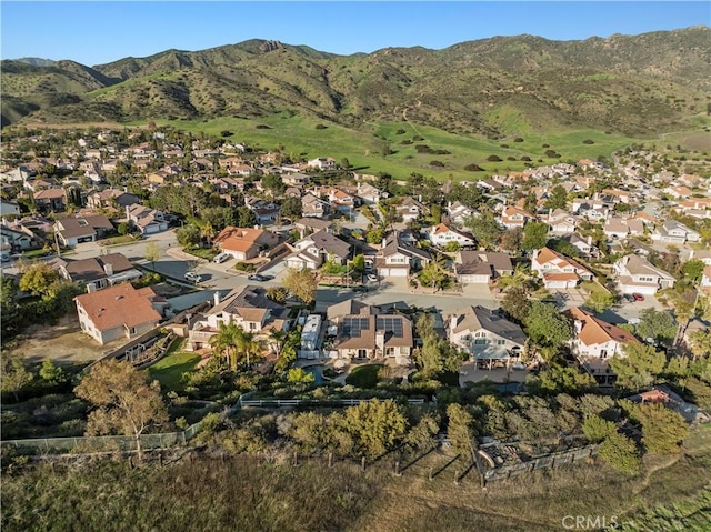 bird's eye view with a residential view and a mountain view