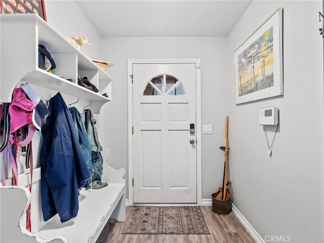 13250 Yellowstone Ave, Victorville, CA 92395 - mudroom with wood finished floors and baseboards