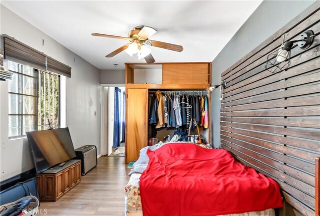3580 Griffin Ave, Los Angeles, CA 90031 - bedroom featuring light wood-style flooring, a closet, and ceiling fan