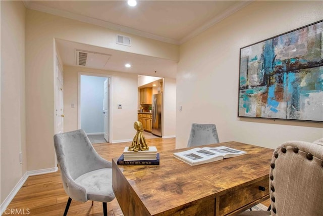 12011 Goshen Ave Unit 203, Los Angeles, CA 90049 - office area featuring baseboards, visible vents, ornamental molding, and light wood-style floors
