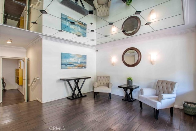 12011 Goshen Ave Unit 203, Los Angeles, CA 90049 - sitting room featuring crown molding, baseboards, and wood finished floors