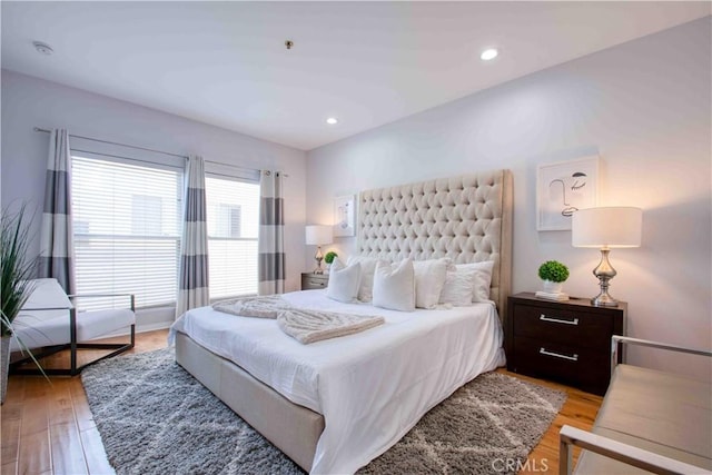 12011 Goshen Ave Unit 203, Los Angeles, CA 90049 - bedroom with recessed lighting and light wood-style flooring
