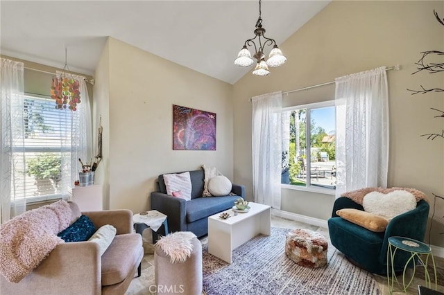 living room featuring a wealth of natural light, baseboards, vaulted ceiling, and an inviting chandelier