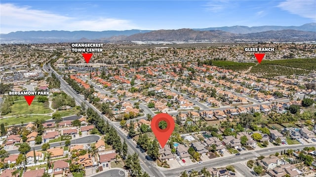 drone / aerial view with a mountain view and a residential view