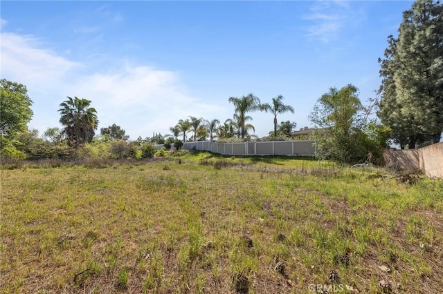 view of yard featuring fence