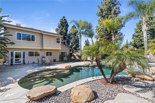pool with a patio