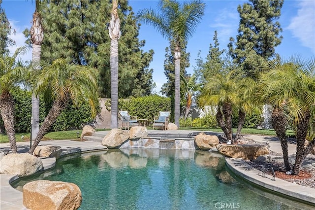 view of pool featuring a fenced in pool and a patio