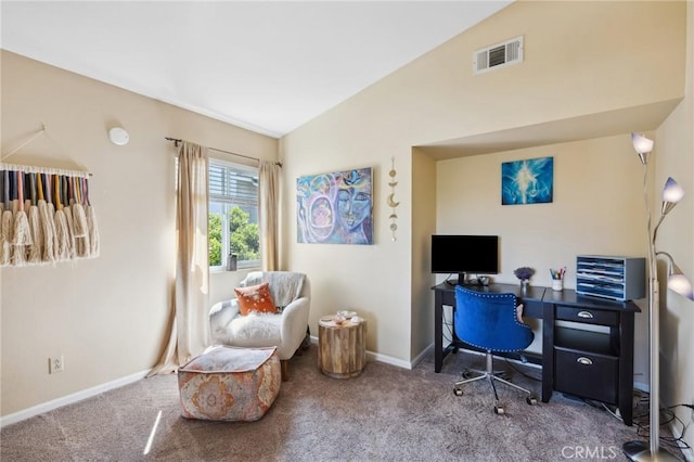 carpeted home office featuring baseboards, vaulted ceiling, and visible vents