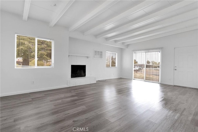 17637 Sultana St, Hesperia, CA 92345 - unfurnished living room with a fireplace, baseboards, beamed ceiling, and wood finished floors
