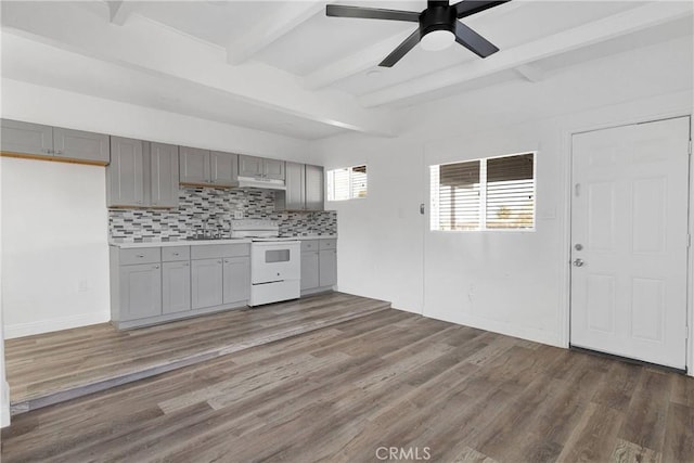 17637 Sultana St, Hesperia, CA 92345 - kitchen with tasteful backsplash, gray cabinetry, beam ceiling, and white range with electric cooktop