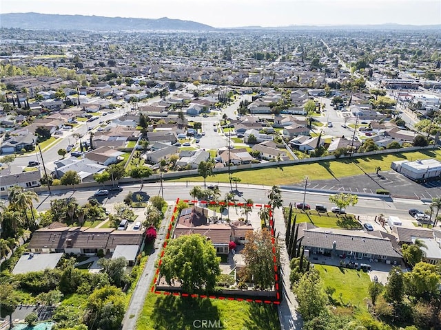 bird's eye view featuring a mountain view and a residential view