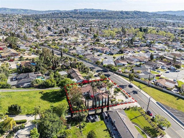 bird's eye view featuring a mountain view and a residential view