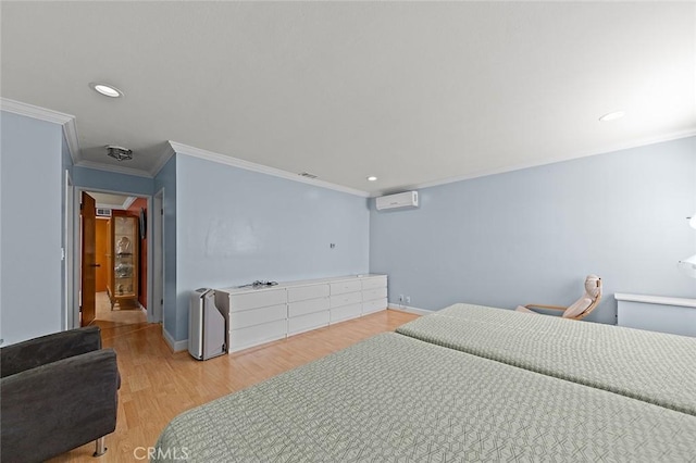 bedroom with crown molding, baseboards, light wood-type flooring, recessed lighting, and an AC wall unit