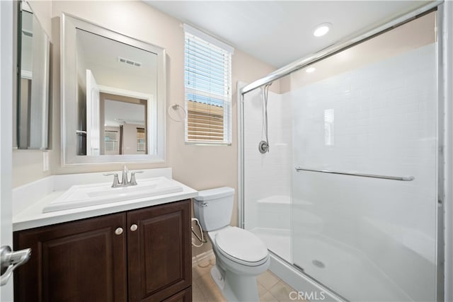 33830 Edge Ln, Temecula, CA 92592 - full bath with visible vents, toilet, a shower stall, vanity, and tile patterned flooring