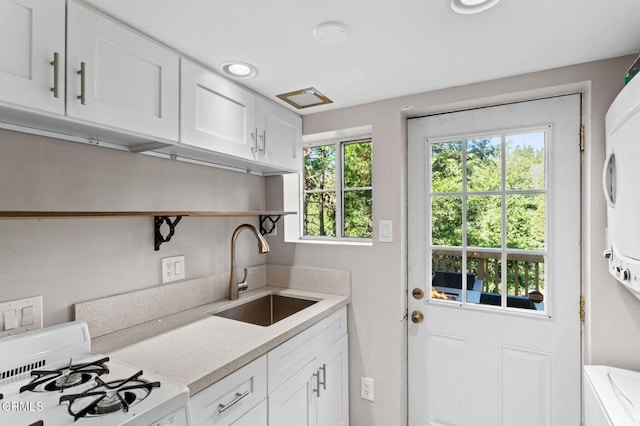 23624 Scenic Dr, Crestline, CA 92325 - kitchen featuring a sink, white range with gas stovetop, open shelves, and white cabinets
