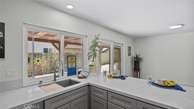 10069 Hershey Way, Riverside, CA 92503 - kitchen with gray cabinets and light countertops