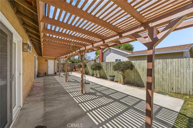 10069 Hershey Way, Riverside, CA 92503 - fenced backyard with a pergola and a patio area