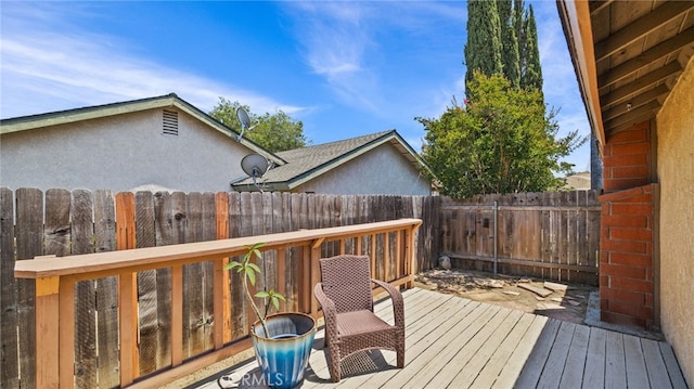 10069 Hershey Way, Riverside, CA 92503 - wooden terrace featuring a fenced backyard