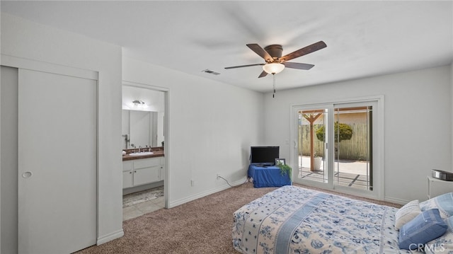 10069 Hershey Way, Riverside, CA 92503 - bedroom featuring access to outside, carpet, ensuite bath, and a ceiling fan