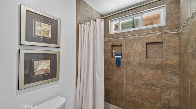 10069 Hershey Way, Riverside, CA 92503 - full bathroom with toilet and a tile shower