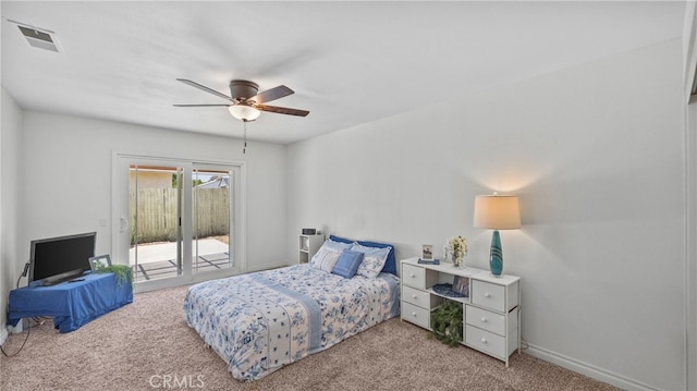 10069 Hershey Way, Riverside, CA 92503 - bedroom with access to exterior, carpet flooring, and a ceiling fan