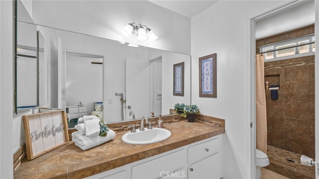 10069 Hershey Way, Riverside, CA 92503 - bathroom with a shower stall and vanity
