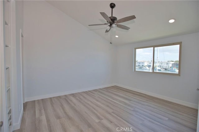 17114 Bluewater Ln Unit 141, Huntington Beach, CA 92649 - unfurnished room with lofted ceiling, light wood-style floors, recessed lighting, a ceiling fan, and baseboards