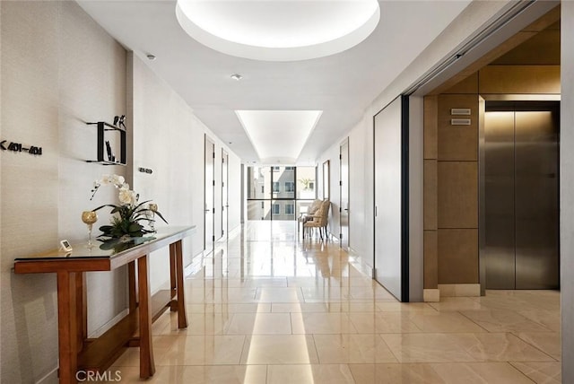 hallway featuring elevator