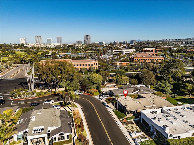 birds eye view of property with a city view