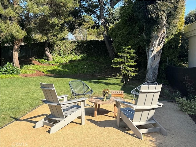 view of patio / terrace featuring fence