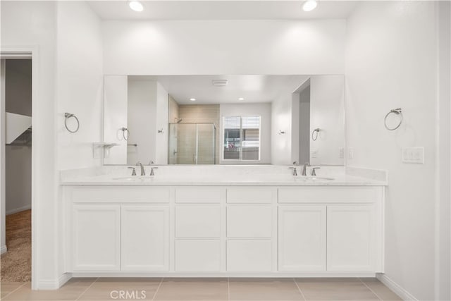 29391 Santa Ynez Cir, Menifee, CA 92584 - bathroom with a shower stall, tile patterned floors, and a sink