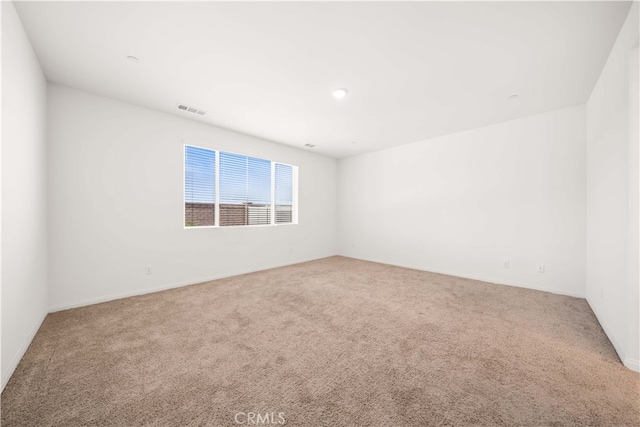 29391 Santa Ynez Cir, Menifee, CA 92584 - empty room featuring carpet flooring, baseboards, and visible vents