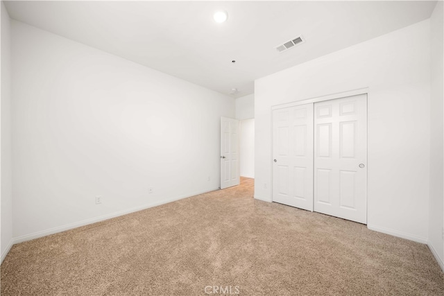29391 Santa Ynez Cir, Menifee, CA 92584 - unfurnished bedroom featuring a closet, baseboards, carpet, and visible vents