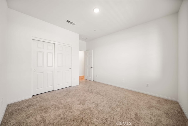 29391 Santa Ynez Cir, Menifee, CA 92584 - unfurnished bedroom featuring carpet flooring, visible vents, a closet, and baseboards