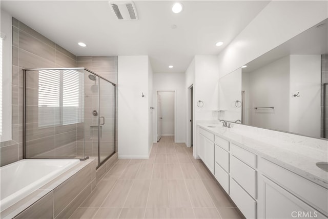 29391 Santa Ynez Cir, Menifee, CA 92584 - bathroom featuring a shower stall, a bath, visible vents, recessed lighting, and a sink