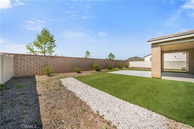 29391 Santa Ynez Cir, Menifee, CA 92584 - view of yard with a patio area and a fenced backyard