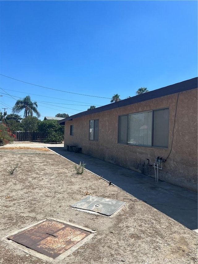 view of home's exterior with stucco siding