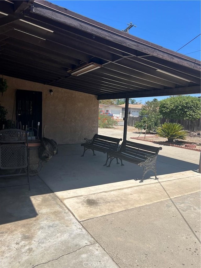 view of patio / terrace with fence