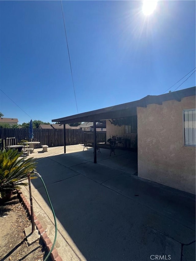 view of patio / terrace with fence