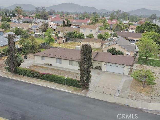 bird's eye view featuring a mountain view and a residential view
