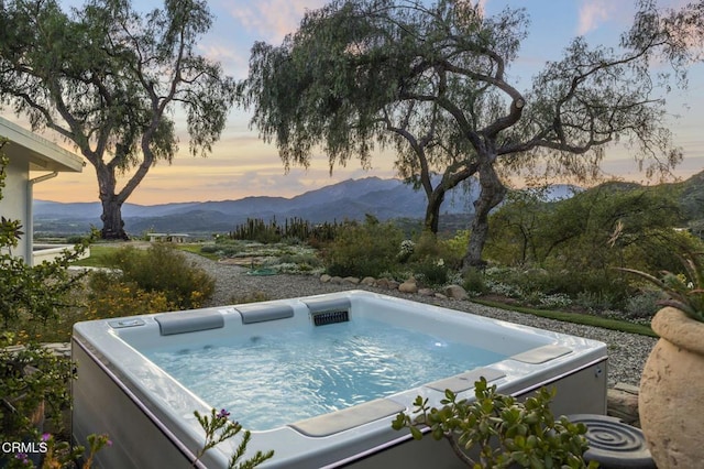 1417 Foothill Rd, Ojai, CA 93023 - view of swimming pool with a hot tub and a mountain view