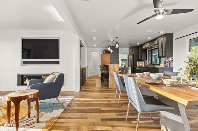 1417 Foothill Rd, Ojai, CA 93023 - dining room featuring light wood-style floors, recessed lighting, a ceiling fan, and baseboards