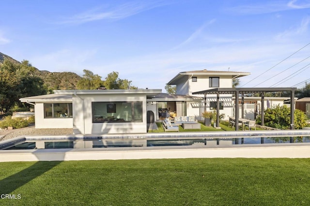 1417 Foothill Rd, Ojai, CA 93023 - rear view of house with a yard, an outdoor pool, a patio, and stucco siding