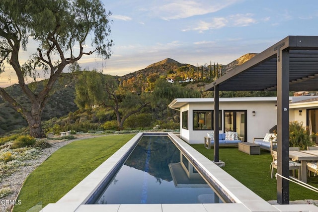 1417 Foothill Rd, Ojai, CA 93023 - view of pool featuring a mountain view, an outdoor living space, and a yard
