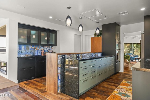1417 Foothill Rd, Ojai, CA 93023 - indoor bar with dark wood-style flooring, pendant lighting, and recessed lighting